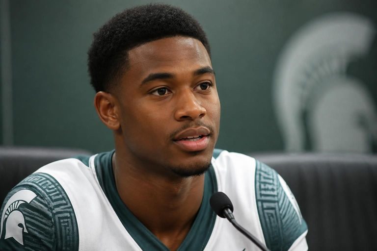 tre holloman revient sur sa décision de quitter msu et évoque la possibilité d'un retour, offrant un regard inédit sur ses motivations et perspectives futures.