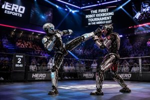 découvrez le premier tournoi de kickboxing avec robots humanoïdes au moyen-orient, organisé par hero esports, alliant technologie de pointe et sport de combat.